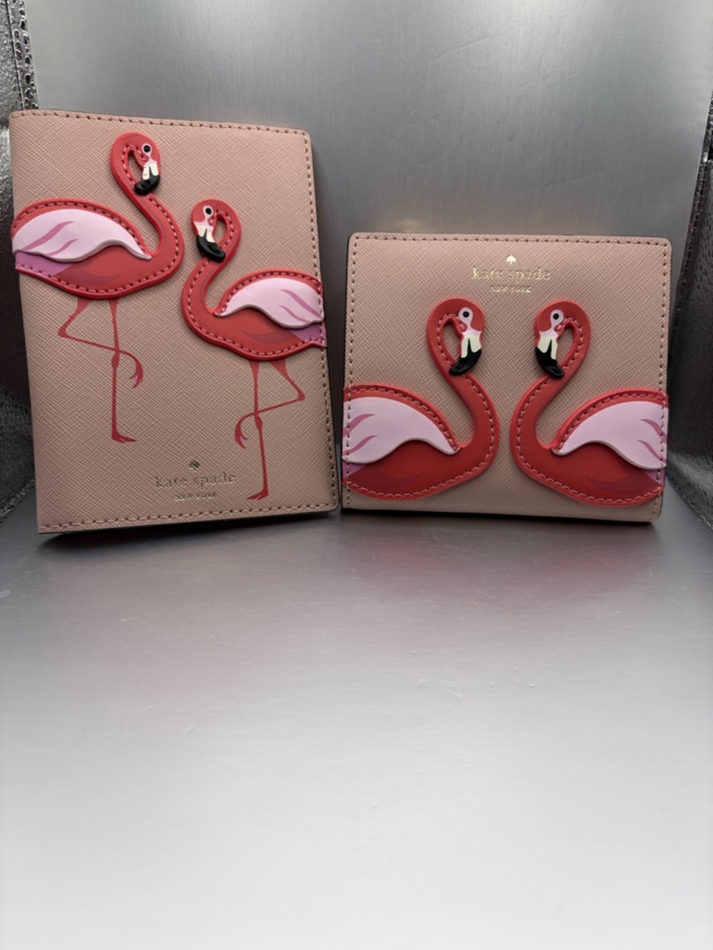 Kate Spade lot of two. Passport holder (new) and bifold wallet (like new)